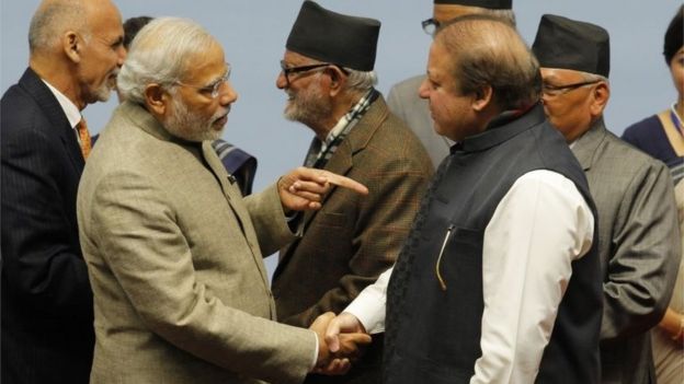 This file photo taken on November 27, 2014 shows Indian Prime Minister Narendra Modi (2L) point a finger at Pakistan