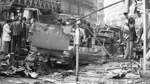 Destroyed cars are seen in the Rue Marbeuf in Paris after a bomb attack in front of the building of the Lebanese journal 'Al Watan al Arabi', on 22 April 1982.
