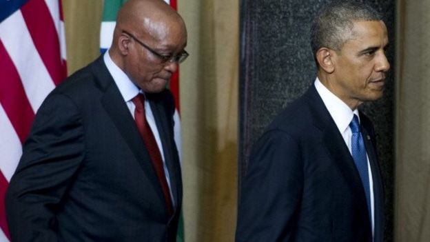 South African President Jacob Zuma (L) and US President Barack Obama leave following a joint press conference at the Union Building in Pretoria, on 29 June 2013.