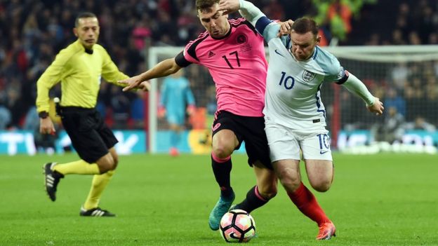 Wayne Rooney in action against Scotland