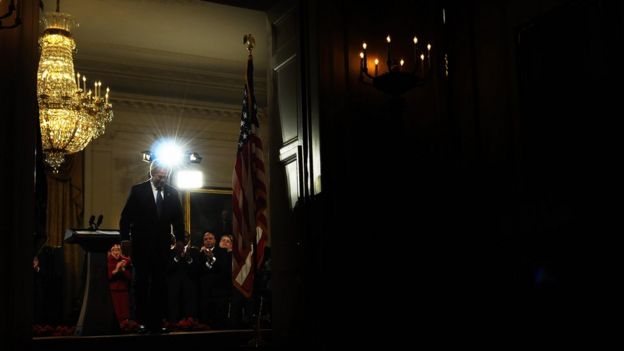 US President George W. Bush leaves after delivering ha final farewell speech to the nation at the East Room of the White House in Washington, DC, on January 15, 2009. In a sober farewell address, Bush has celebrated the 'hope and pride' Barack Obama inspires and urged an often divided America to unite to overcome terrorism and economic crisis. Obama, due to become the first black US president on January 20th, is 'a man whose history reflects the enduring promise of our land,' Bush said in what was due to be his last televised speech to the nation he led for eight years