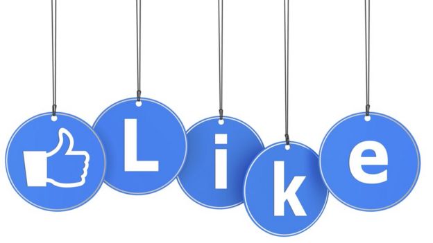 Facebook thumbs up and the word