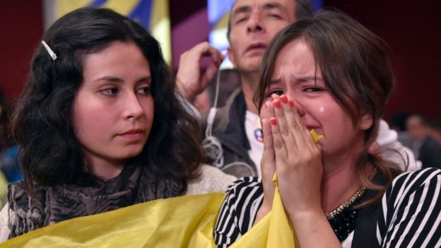 A woman cries after knowing the results of a referendum on whether to ratify a historic peace accord to end a 52-year war between the state and the communist FARC rebels, Colombia, on 2 October 2016