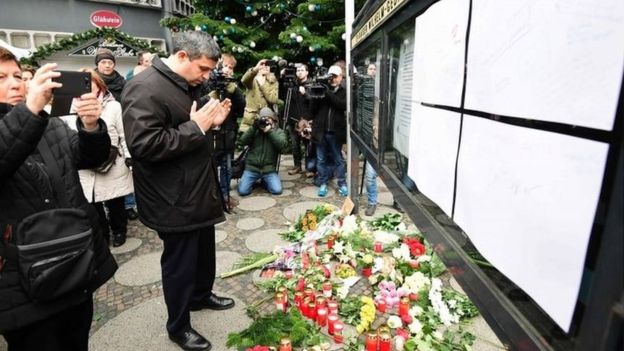 People pay tribute to victims of Berlin attack on 20 December