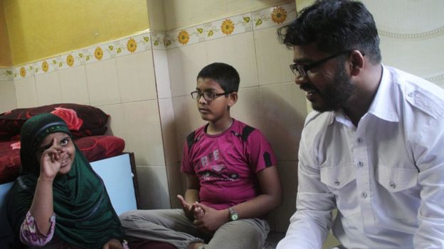 Mr Shaikh with his children, now aged 10 and 11