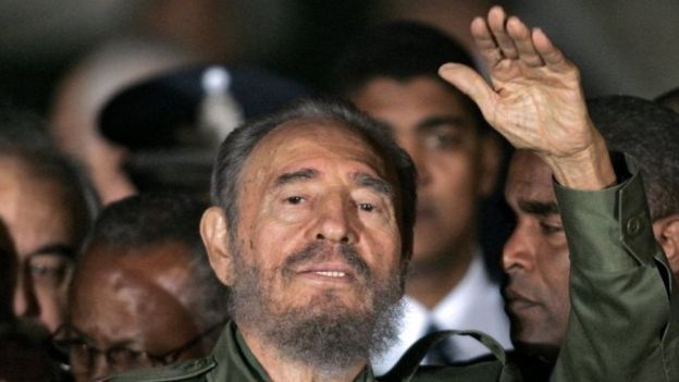 This file photo taken on July 21, 2006 shows President of Cuba Fidel Castro waving upon his arrival at Cordoba airport to participate to the Mercosur's presidential summit in Cordoba, Argentina. Cuban revolutionary icon Fidel Castro died late on November 25, 2016 in Havana, his brother, President Raul Castro, announced on national television