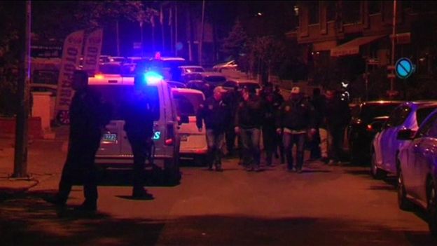 Still from Reuters of police cars in the street, 3 November 2016