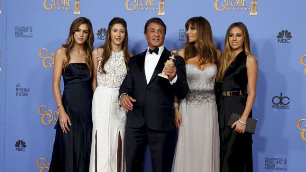Sylvester Stallone with his wife and daughters after winning a Golden Globe
