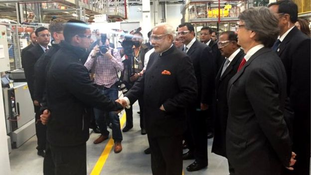 Narendra Modi shaking hands