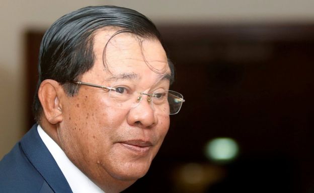 Cambodia's Prime Minister Hun Sen smiles as he arrive at the National Assembly of Cambodia during a plenary session, in central Phnom Penh, 20 February 2017.