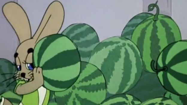 Photo of a cartoon animation of a hare listening to watermelons from the Russian cartoon Nu, pogodi!
