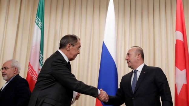 Los ministros de relaciones exteriores de Rusia, Turquía e Irán después de una reunión el 20 de diciembre de 2016
