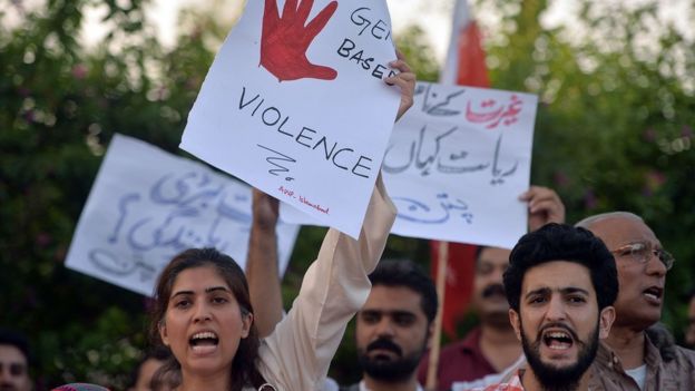 Pakistani civil society activists carry placards during a protest in Islamabad on July 18, 2016 against the murder of social media celebrity Qandeel Baloch by her own brother