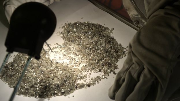 Pile of rough diamonds on a table
