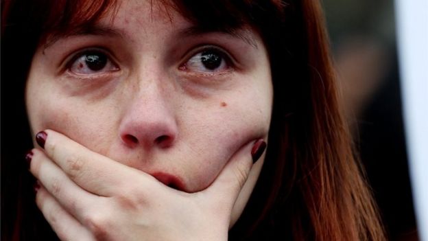 A woman reacts after hearing the results of the peace deal referendum in Bogota, Colombia, 02 October 2016. Colombians voted 