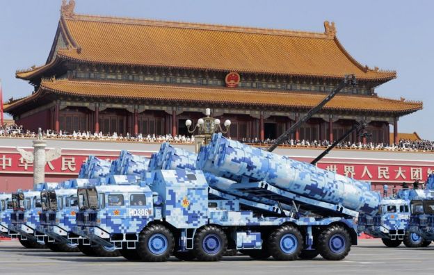 Military vehicles carrying shore-to-ship missiles drive past the Tiananmen Gate during a military parade to mark the 70th anniversary of the end of World War Two, in Beijing, China, 3 September 2015