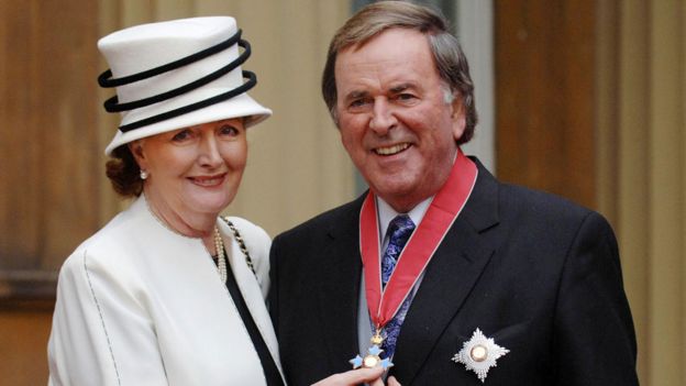 Sir Terry Wogan with his wife Lady Helen, after collecting his Knighthood