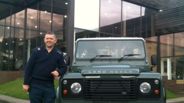 Simon Collins with his latest Defender, a 2013 Defender 90
