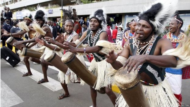 Traditional Chuka drummers celebrate as they welcome the national athletics team at the Jomo Kenyatta airport in Nairobi