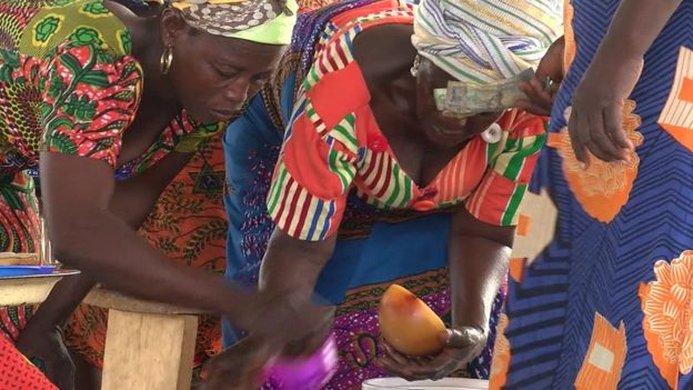 Shea butter makers at market in Anateem, Ghana