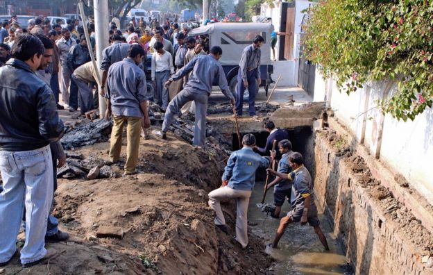 Clothes and body parts were fished out from a drain adjoining Moninder Singh Pandher's house