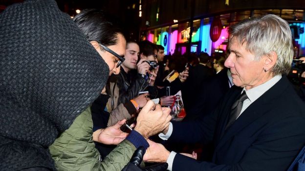 Harrison Ford signed autographs for fans on the red carpet