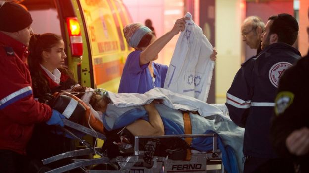 Emergency teams handle a wounded Israeli following a stabbing attack, at the Shaare Zedek Medical Center in Jerusalem, Israel, 25 January 2016.