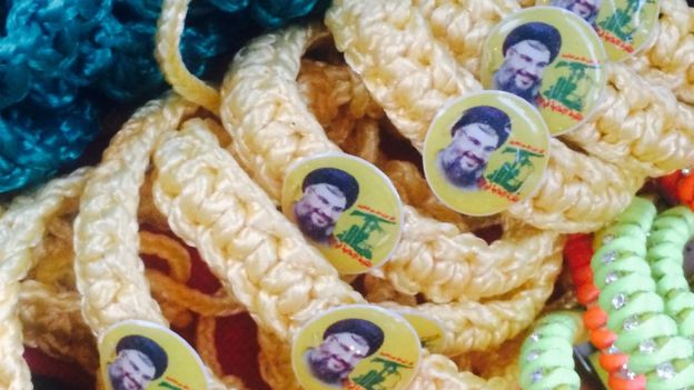 Bracelets featuring vital Assad ally Hezbollah leader Hasan Nasrallah in Damascus old city