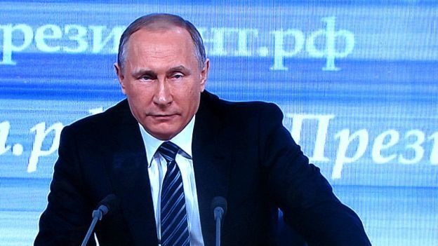 путін