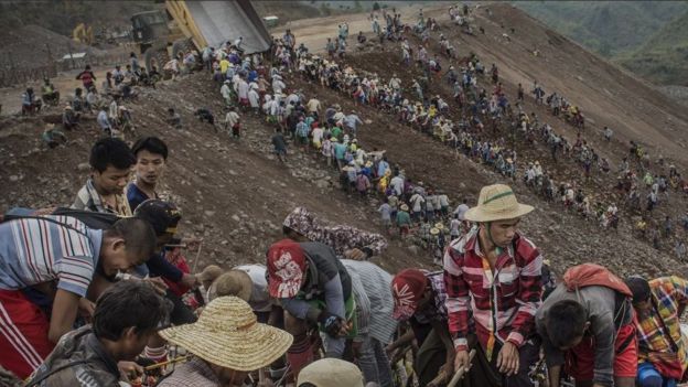 Workers at a Myanmar jade mine