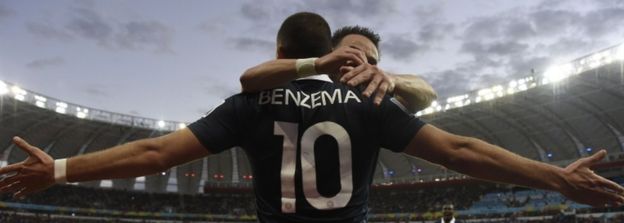 Karim Benzema celebrating with France's midfielder Mathieu Valbuena