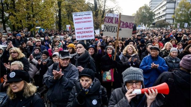 Polish people rally against plans to tighten abortion laws in Warsaw, Poland, 23 October 2016