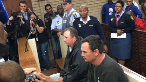 Theo Martins (L) and Willem Oosthuizen in court