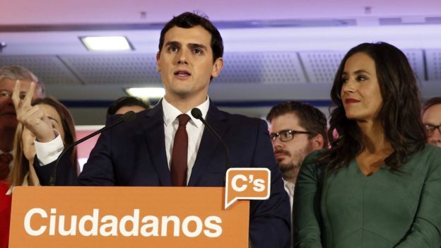 Leader and candidate of Ciudadanos (Citizens) Party Albert Rivera (L) celebrates with his supporters the results of the general elections in Madrid