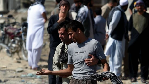 An Afghan man cries as he searches for his relatives near Camp Integrity, a Nato base in Kabul - 8 August 2015