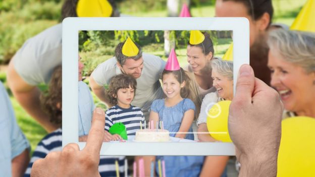 A family scene on a tablet computer