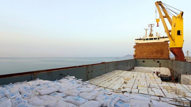 A handout picture released by the World Food Programme (WFP) shows a UN aid ship docked in Yemen's port city of Aden on (21 July 2015)
