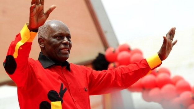 Angolan President Jose Eduardo dos Santos Angolan greets the crowd on August 29, 2012 during the final election campaign rally in Kilamba Kaixi on the outskirts of Luand