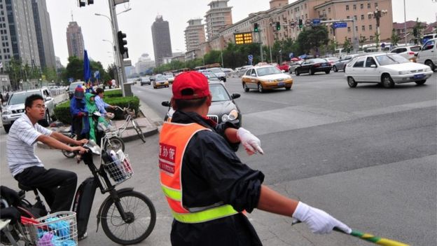 Traffic warden, China (Getty Images)
