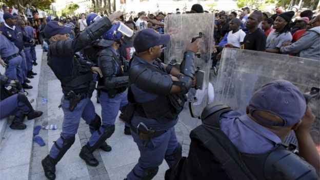 Police clash with students outside South Africa's Parliament in Cape Town, October 21, 2015