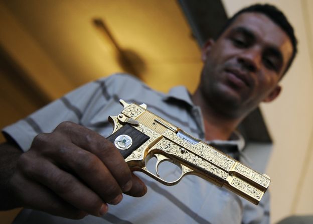 Nabil Ali Dagouich with gun