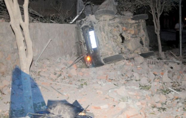 An overturned car is seen after explosions hit Liucheng county, Guangxi Zhuang Autonomous Region, China, 30 September 2015.