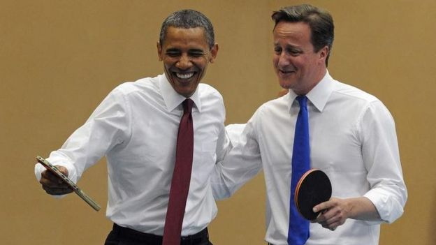 David Cameron playing ping pong with President Obama