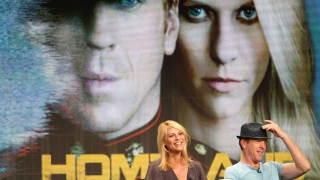 Actors Claire Danes and Damian Lewis speak at a panel event about Homeland