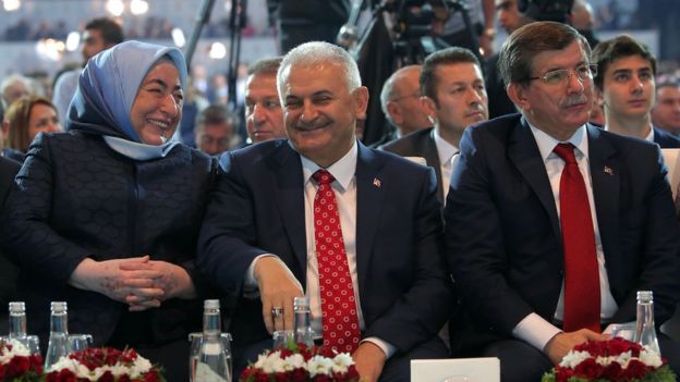 Ahmet Davutoglu (right) sits alongside Mr Yildirim and his wife at the congress in Ankara, 22 May