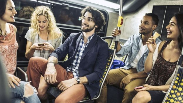 Young friends on a night bus