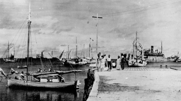 Pier on Jaluit Atoll with a group of people