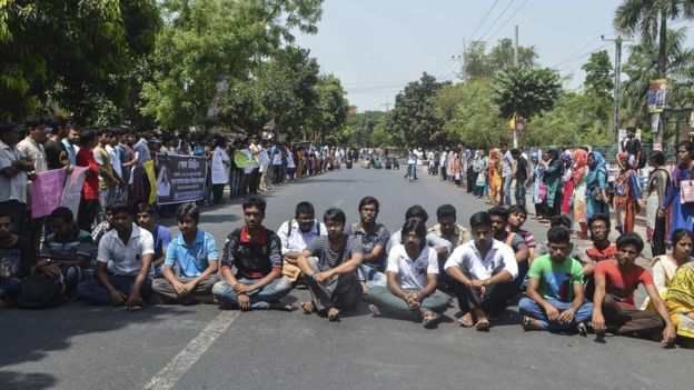Rajshahi University students protest against the hacking to death of one of their professors