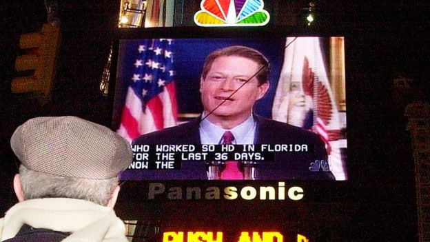 New Yorkers watch Al Gore's concession speech in 2000.