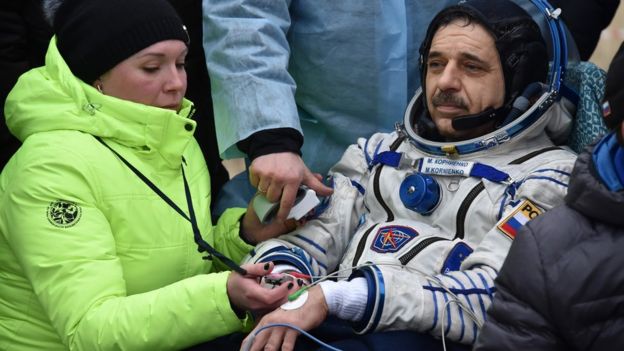 Cosmonaut Mikhail Kornienko after touchdown. 2 March 2016